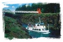 The MV Schwatka sails through historic Miles Canyon on the Yukon River. Click for more information