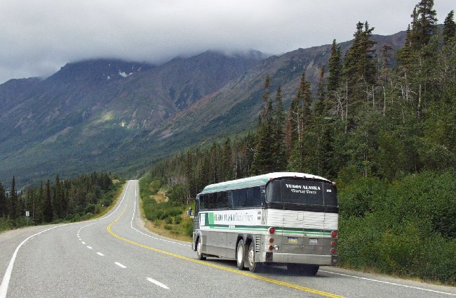 A Yukon Alaska Tourist Tours motorcoach en route from Whitehorse, Yukon to Skagway, Alaska.